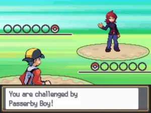 A gameplay screenshot of Pokemon SoulSilver, depicting the beginning of a battle. The text reads: "You are challenged by Passerby Boy!"