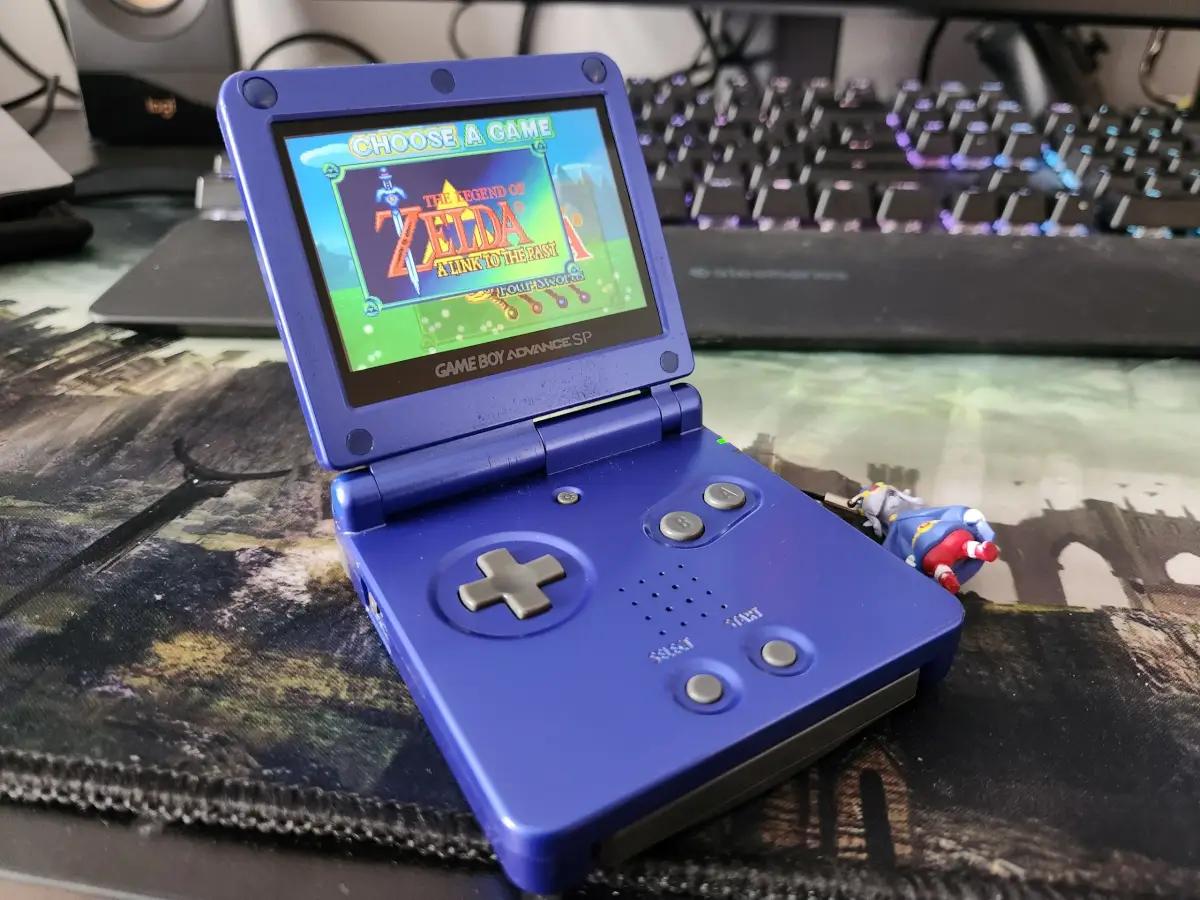 Gameboy Advance SP playing Legend of Zelda: A Link to the Past